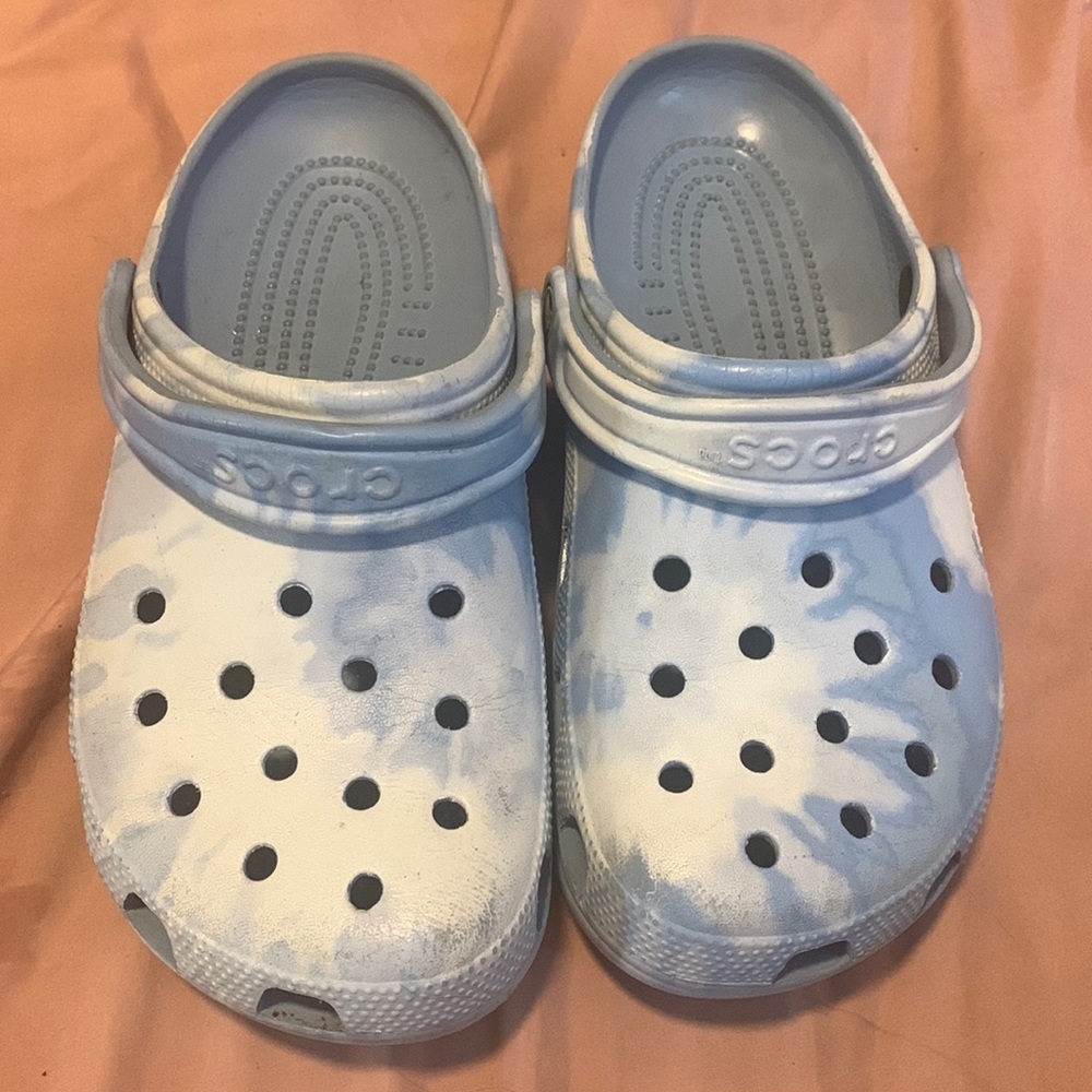 Blue and white tie dye crocs.